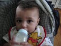 kid Jake, 6 months, how to bounce and drink milk!