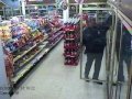 Dancing Officer caught in store cam