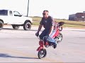 107 foot stoppie on a stock honda 50 motorcycle performed by Chris Gilmore.