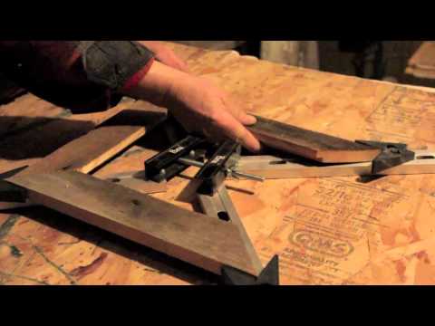 making picture frames - Fuzzy showing everyone how to make a picture frame out of old discarded barn boards.