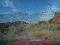 Driving Jeep at Eldorado Valley Highland Mountain Range