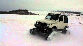 Suzuki Samurai with Camoplast Tatou 4s tracks