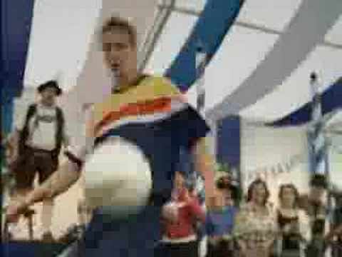 soccer commercial - Soccer players show off their talents in front of local singers and dancers in Bavaria..the prize is Pepsi.
