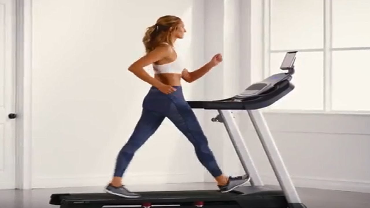 woman walking on a treadmill