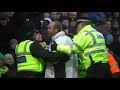 FAN AT NORWICH MATCH RUNS ONTO PITCH HUGS SUAREZ THEN MOONIES