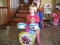 Júlia playing the batery