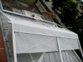 Toldo brazo invisible