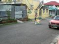 Neya and Gian riding in bike outside