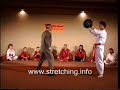 Tom Kurz throws high roundhouse kicks without any warm-up