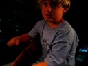 Tucker playing guitar. Red Hot Chili Peppers