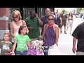 katie holmes and suri along with a group of family and friends arrive at alices tea cup for lunch.