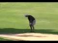 Anthony chips up to the 18th green
