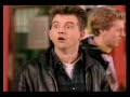 Three men stand outside a corner shop, one of them drinks a can of Tango. The voiceover breaks in and the scene is replayed like a sports replay. Out of the background a large orange man sprints towards the man drinking the can, taps him on the shoulder, the man turns and the orange man slaps him. The he disappears. Tango: You know when you've been Tango'ed. Tango: Orange Man Agency: HHCL/Red Cell Creative: Steve Henry; Trevor Robinson; Alan Young Director: Matt Forest Production: Limelight Commercials Producer: Storr Redman Director of Photography: Nic Morris Brand: Tango