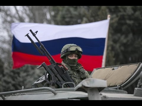 polit - http://www.democracynow.org - Russian President Vladimir Putin is rebuffing warnings from the U.S. and European Union as the crisis in Ukraine threatens one ...