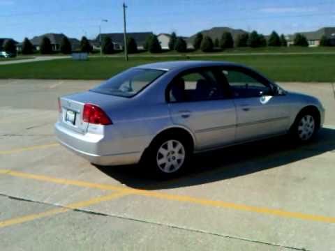 2002 honda civic ex sedan - I created this video at http://www.youtube.com/editor. This car belongs to my grandparents. It is a seventh generation (2001-2005) Civic. Silver with the gre...