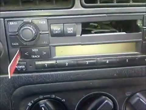 how to remove cd player from vw golf