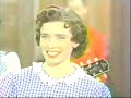 june does a hilarious skit with faron young then the carter family joins her to sing 