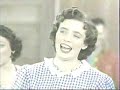 june does a hilarious skit with faron young then the carter family joins her to sing 