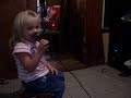 Leslie playing Americal Idol on the ps2