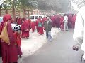 monks are rushing back to the monastery 
so they can have lunch and then return to the mahabodhi stupa to continue the kagyu monlam. for two weeks from early morning hours until night, a large assembly of Tibetan Buddhist monks and nuns of the Kagyu tradition are gathering in india in bodhgaya, where buddha was enlightened, to pray and meditate for peace and happiness in the world. for more on this monlam festival, see http://www.kagyuoffice.org/karmapa.currentactivities.html#vision - Monks at Kagyu Monlam Prayer Festival in Bodhgaya