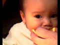 Aiden tries his first orange
