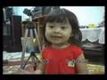 My young Asian daughter singing. JK