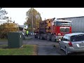 Click here to watch this video Logging truck squeezes past jack-knifed trailer part 1 of 2