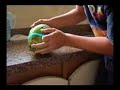 Furando o coco com uma bala de iogurte!