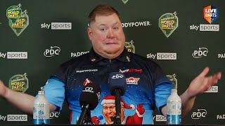 Scott Williams reacts to Rob Cross' CRUDE GESTURE on stage during World Championship clash