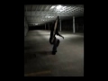 skateboarding in parking garage on longboards
