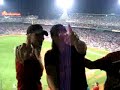 jill and kate have made a video with kelly in the red sox game. kelly is singing and making jokes in the video.