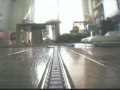 nゲージの余剰のE231系のサハを先頭車改造し、小田急クヤ31のように一般車両の先頭に連結して検測をする検測車にしました。検測と言っても架線検測・軌道検測は当然ダミーですが、表現は余剰パーツなどでまとめてそれっぽくしてあります。車体側面はペーパースキン構造として工作の簡略化を図りました。 ちなみにクヤとしての車輌種別の表示は「撮影」としてあります。
