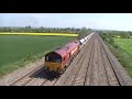 Due to a fatality near Newbury on the Berks & Hants line, freight trains hauled by 59s were being diverted via the GWML as a result. Here we see DBS's 59203, still in its former EWS livery, speeding through Cholsey's Manor Farm Bridge on a westbound 'Hanson' jumbo train with a nice 2-tone from the driver. Enjoy! :)