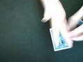 Card levitation 2 :: A card levitates out of a hand.