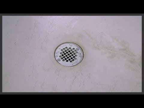how to open shower drain cover
