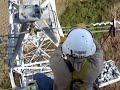 AIR2 Lineman installing shield wire bond.