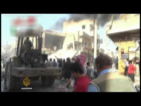 regime - More than 30 people have died in the Syrian village of Alatarb, north of Aleppo, after government jets bombed a crowded market. Opposition fighters also claimed that they destroyed a weapons...