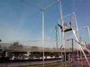 Leeha doing tricks on the trapeze