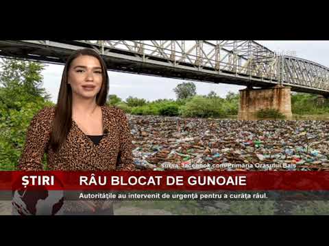 Râu blocat de gunoaie