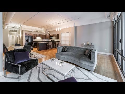 A 1-bedroom, 1 ½ bath Streeterville loft steps from the beach at Axis A 1-bedroom, 1 ½ bath Streeterville loft steps from the beach at Axis