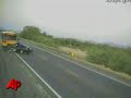 Raw Video: Car Hits School Bus Head-On