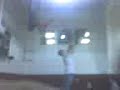 benny jumping off a chair trying to dunk backwards...