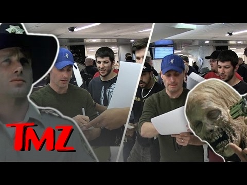 Andrew Lincoln Signs A Billion Autographs At LAX!