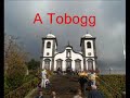 a ride down a steep road in madeira in a wicker basket on a sled, steered and held back by two hefty blokes with massive boots!!