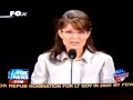 Cameraman at RNC focusing on woman\