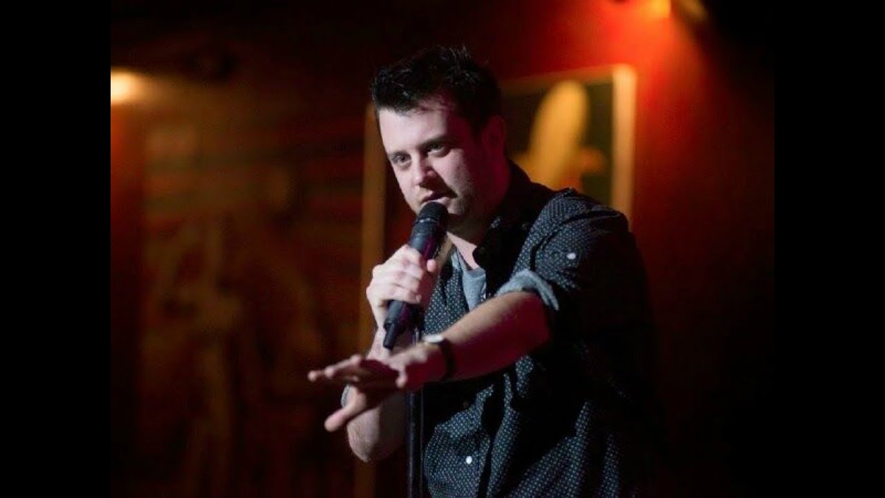 Cover image - Kevin Bartini is a stand up comedian who has warmed up crowds for The Daily Show and Colbert. He also talks about his crusade to honor George Carlin.