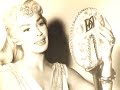 here is a famous song performed by the very glamorous dolores gray.
dolores gray (1924, chicago - 2002, new york) was a well-known actress, singer and dancer, a tony award winning broadway star in the 1940's-1950's. she was tall, blond, long-limbed, statuesque and shapely and she had a big contralto voice. she was opulent, hard-looking, sultry, and distinctive for her sharp somewhat equine features. during her successful music career, she sang marilyn monroe's part on the soundtrack to 