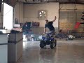 my dad doing dounuts in a four weeler