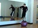 Martial Arts Dancing with weights on Ball Martial Arts Dancing with weights on Ball