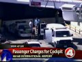 Click here to watch this video Man accused of charging plane's cockpit in Miami